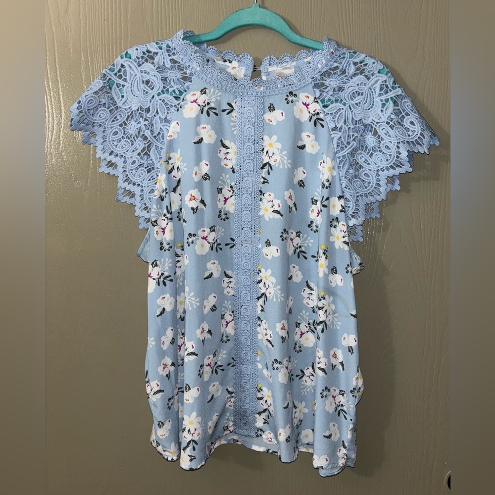 Blue floral blouse with lace shoulders